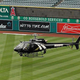 Illustration for article titled The Anaheim Angels Just Used A Helicopter To Dry Off Their Outfield